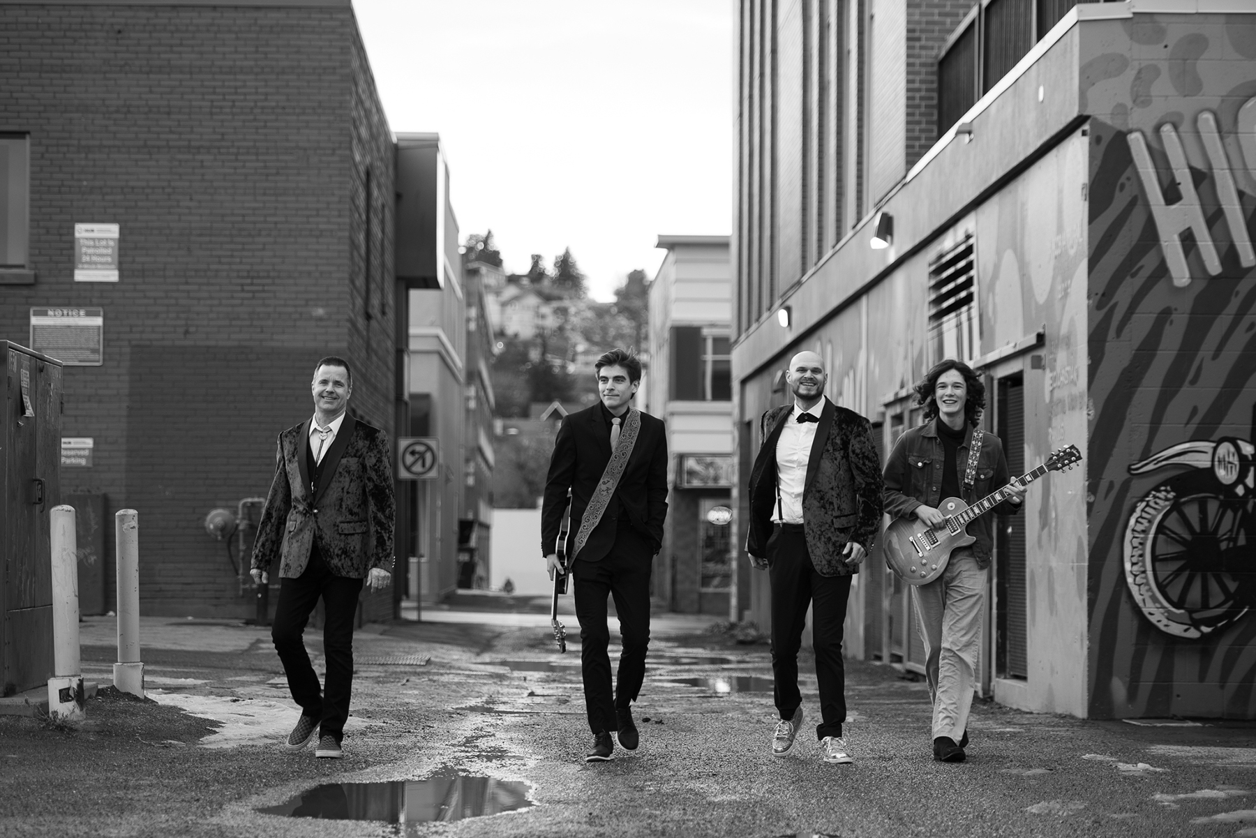 Jeremy Kneeshaw Velvet Groove Blues Band walking in back alley